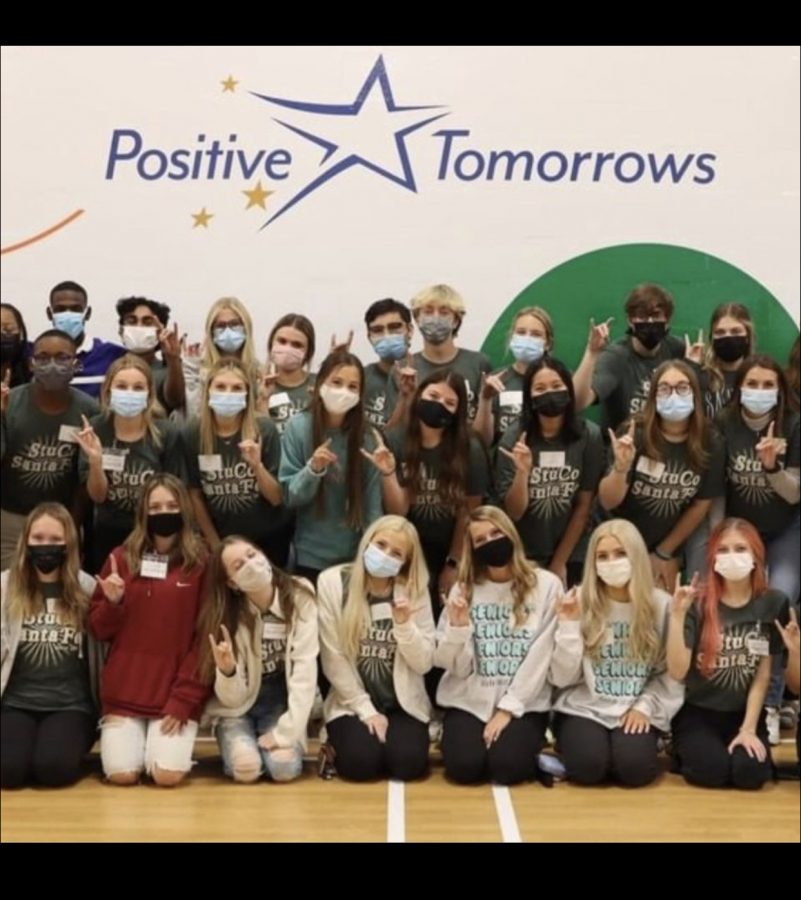 STUCO poses with Positive Tomorrows children.