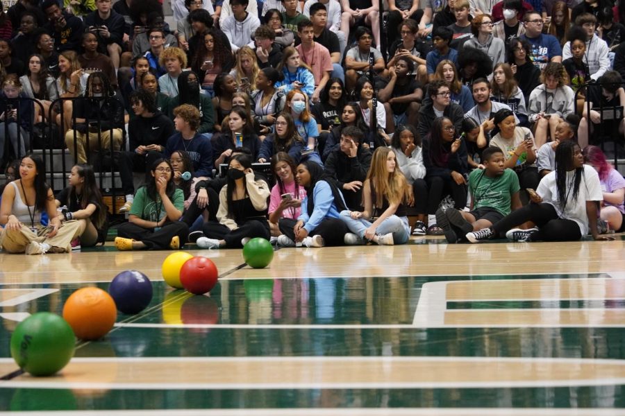 Foam balls lined up at the half court line for the upcoming game of dodgeball.