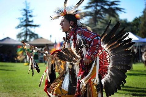 Johnny Velasquez, a member of the Apache tribe from New Mexico and son of Army Korean War Veteran displays his Native American regalia and honors his heritage during the inter-tribal open dance at the Native American Veterans Associations Annual Veterans Appreciation and Heritage Day Pow Wow in South Gate, California, Nov. 8th and 9th.