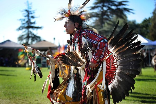 Johnny Velasquez, a member of the Apache tribe from New Mexico and son of Army Korean War Veteran displays his Native American regalia and honors his heritage during the inter-tribal open dance at the Native American Veterans Associations Annual Veterans Appreciation and Heritage Day Pow Wow in South Gate, California, Nov. 8th and 9th.