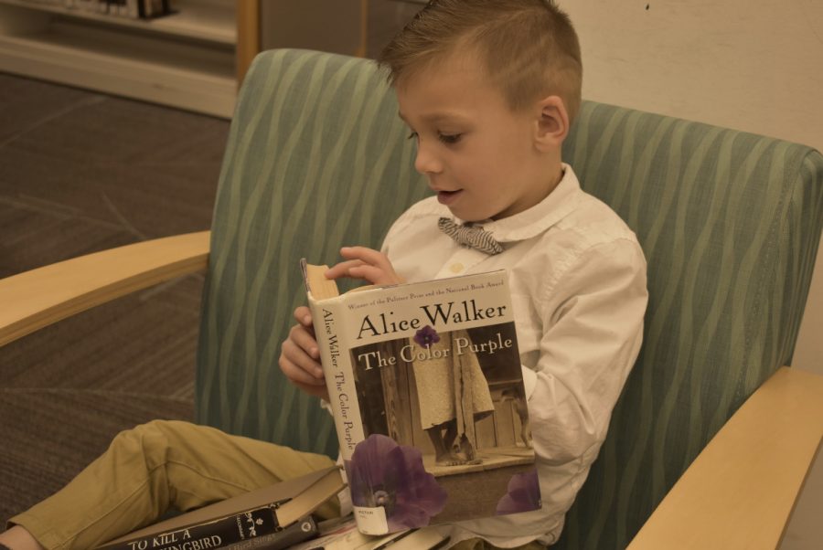 4-year-old Braeden LaDeaux reading The Color Purple