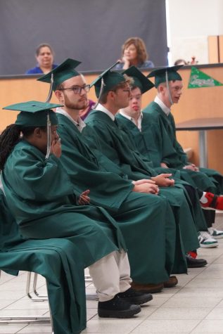 Graduates wait for their walk across the stage. 