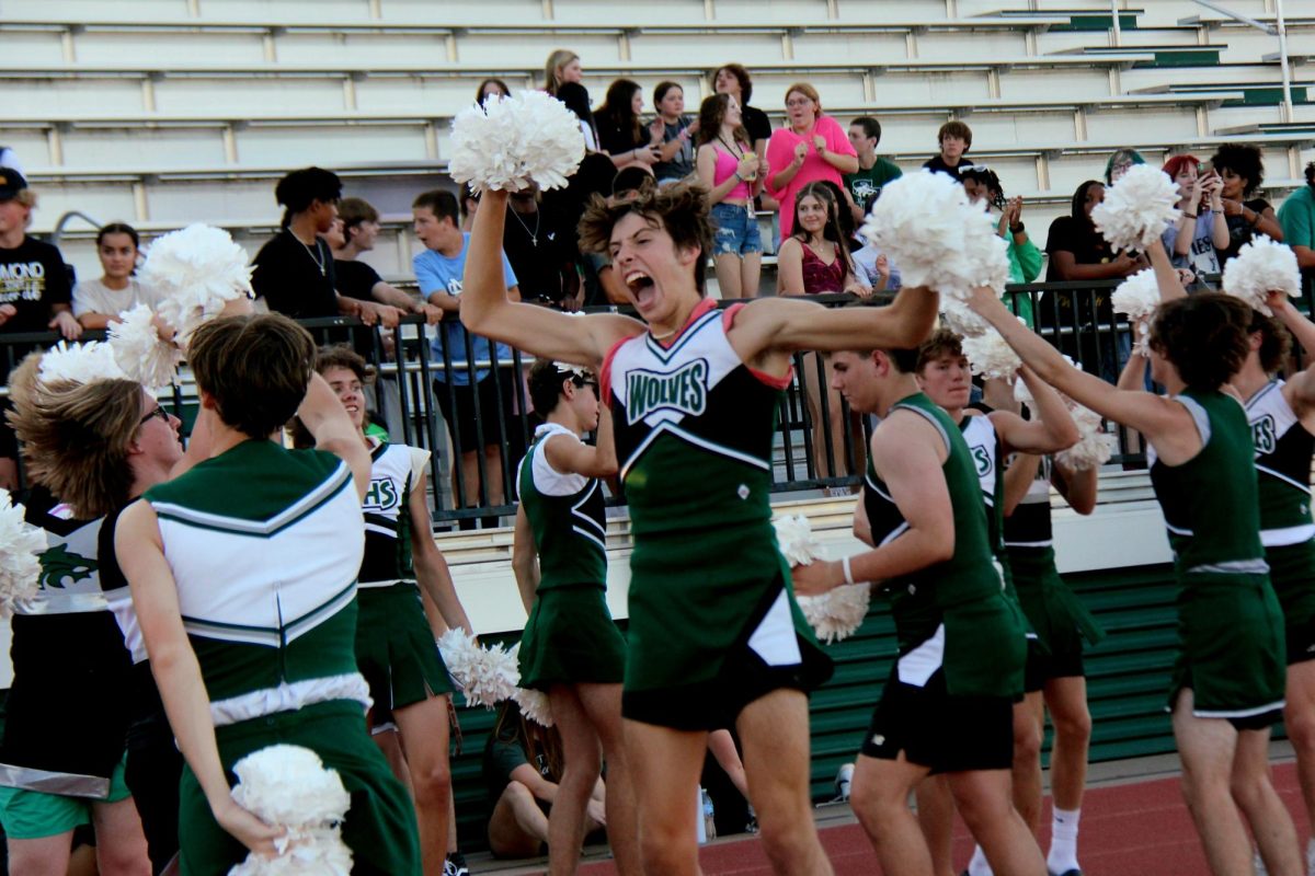Junior Lane Harper shows his excitement as a SFHS cheerleader. 