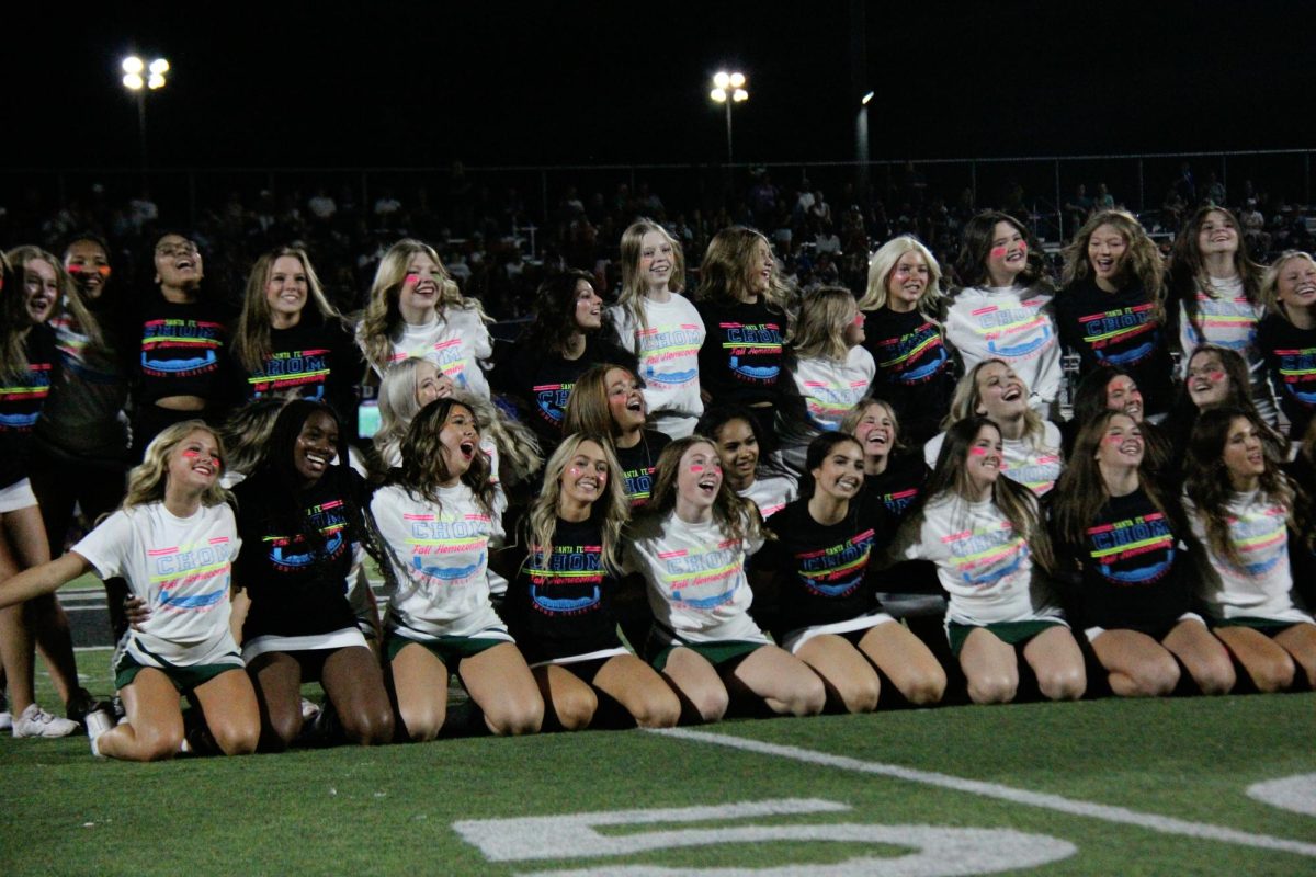 SFHS Cheer and Pom come together for a photo after their joint performance. 