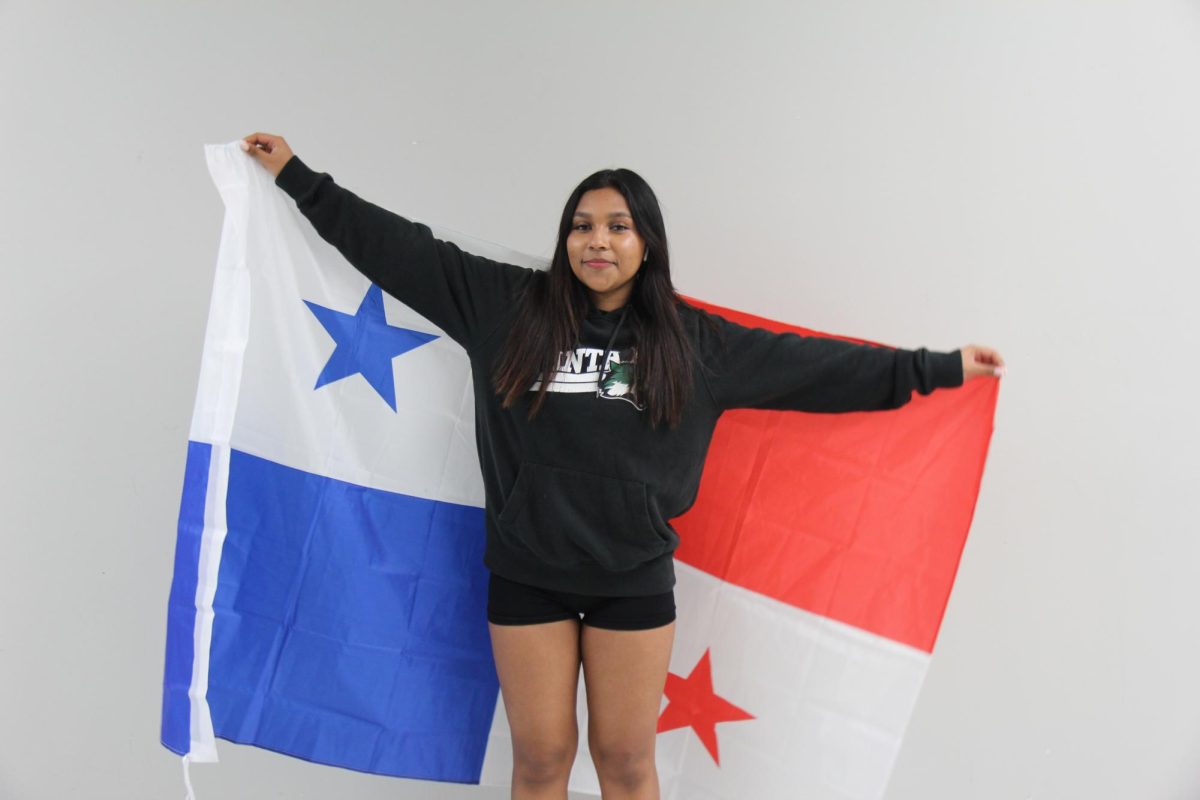 Laura Berrocal Vergara pictured with the Panama flag.