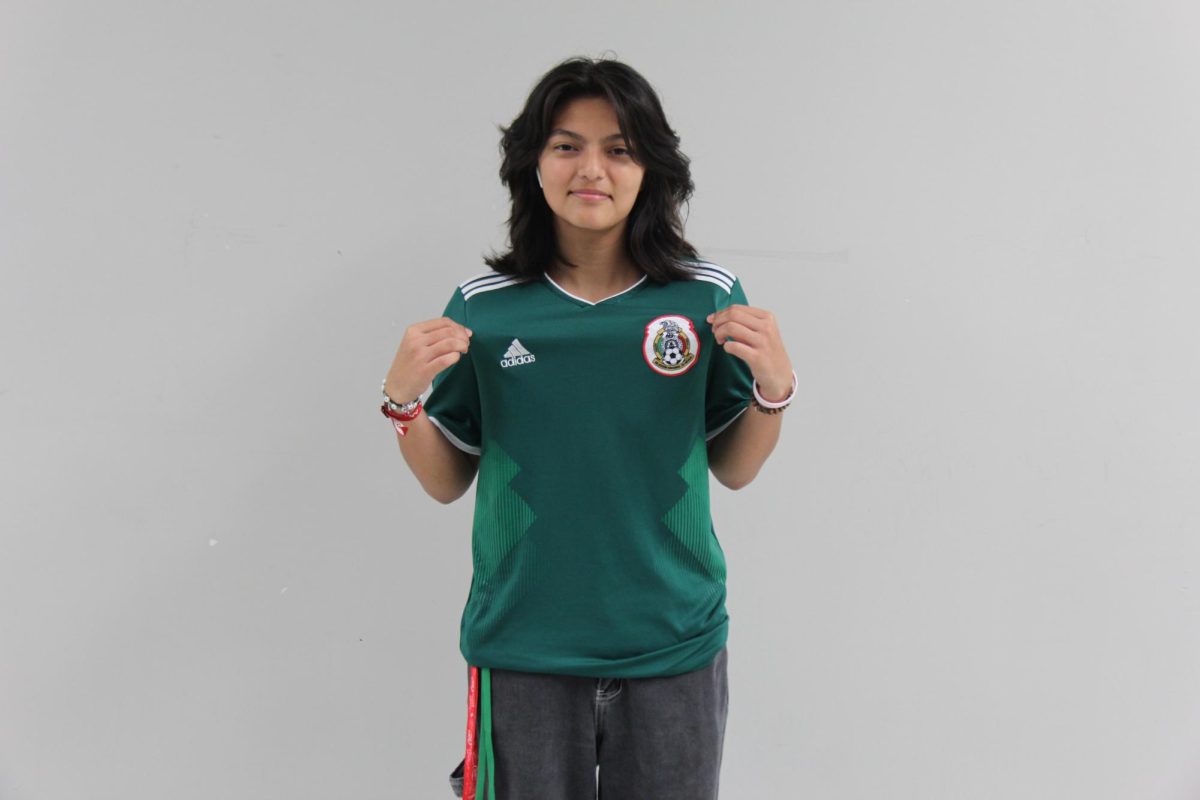 Celeste Sanchez with a Mexican soccer jersey.