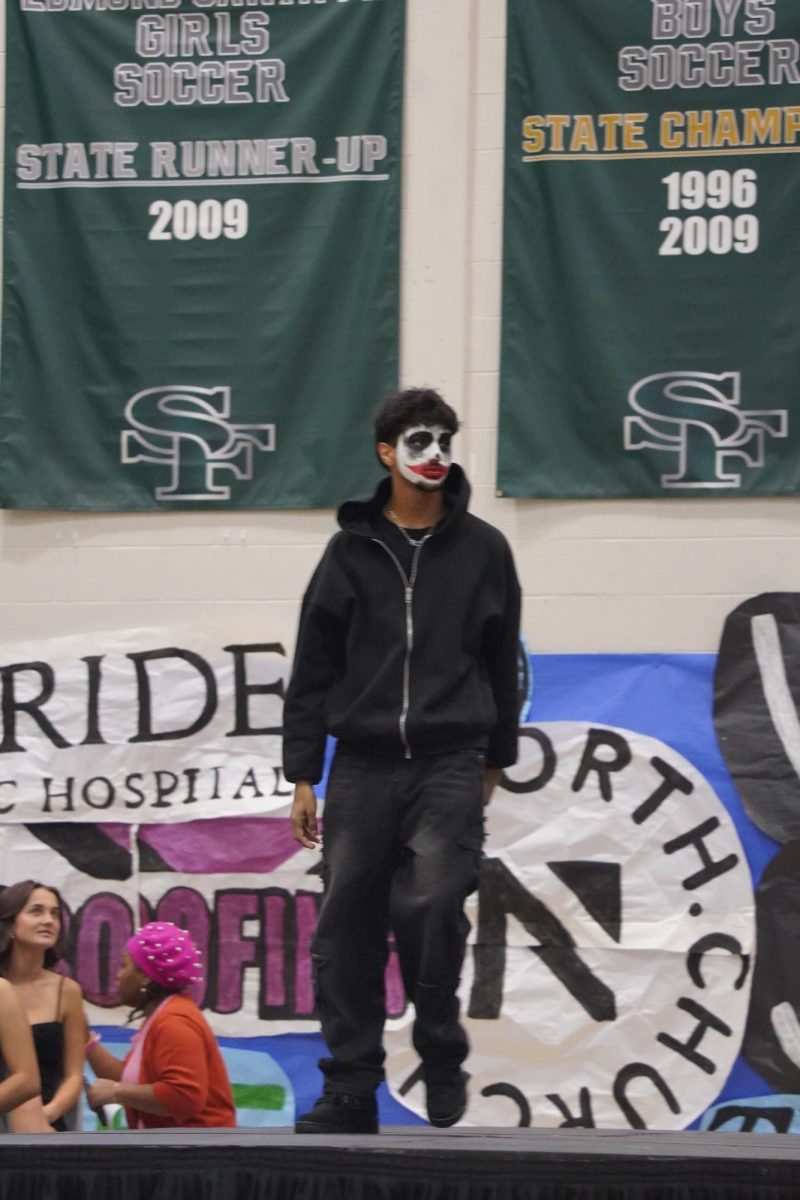 Student as Playboy Cardi during the Hall of Fame Assembly. 