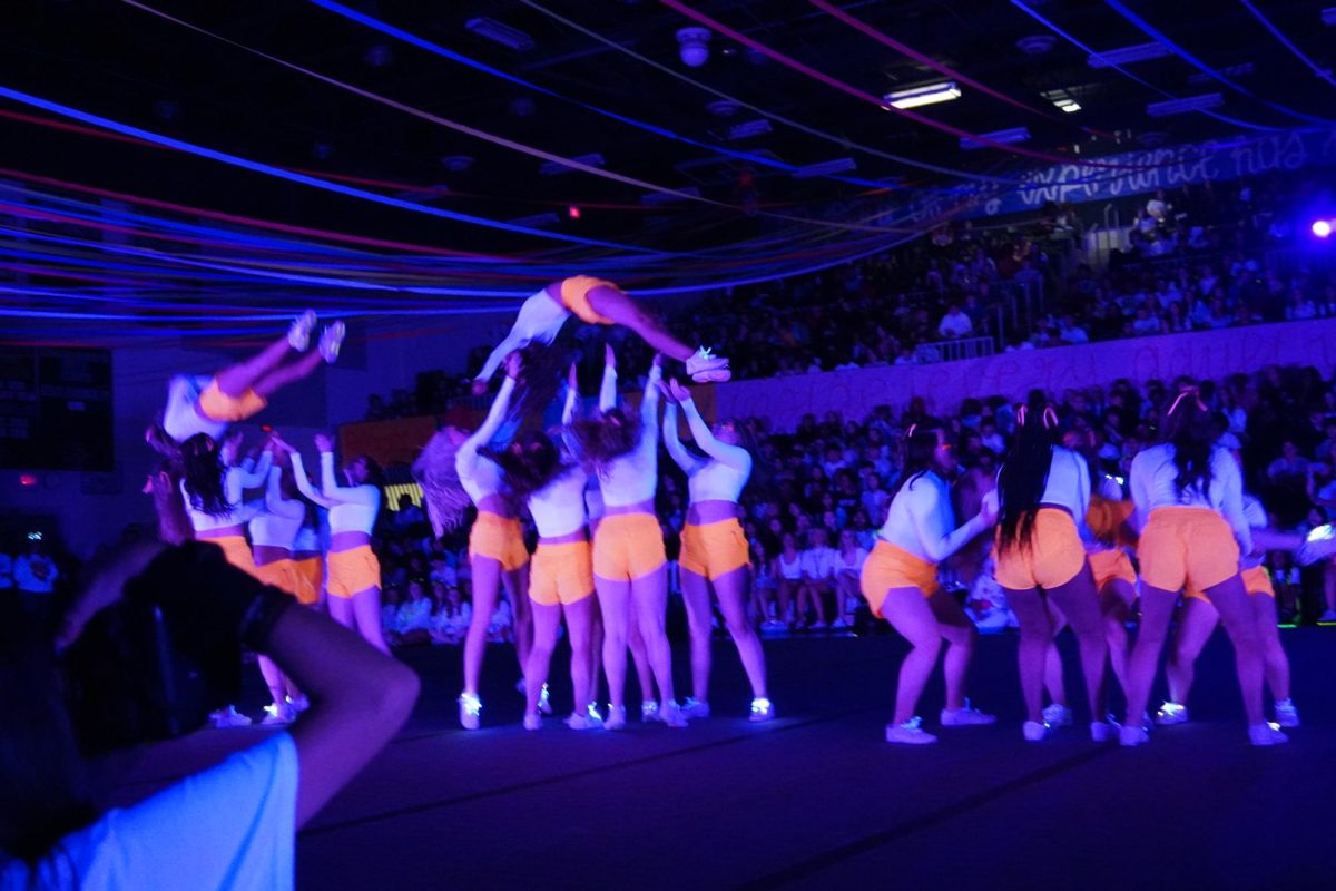 Pom doing there exorcist lifts during Blacklight.