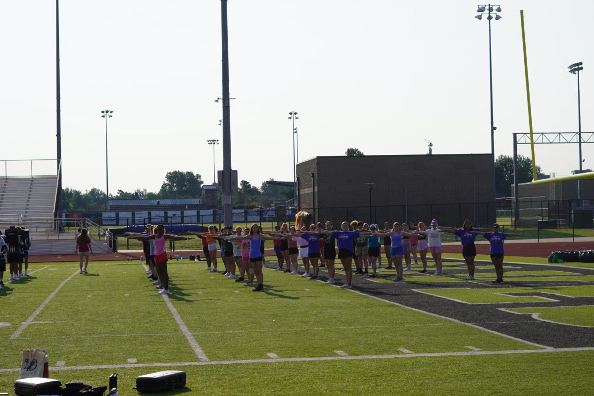 Color Guard forms their lines during morning practice. 