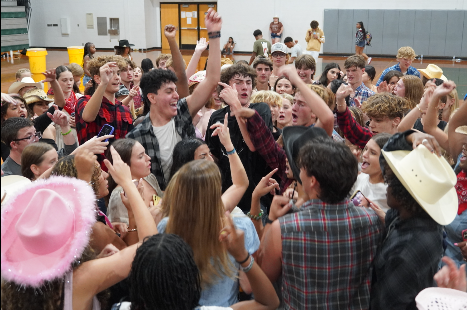 All the students jumping and dancing together to the final song of the night, "No Hands" by Roscoe Dash and Waka Flocka Flame.