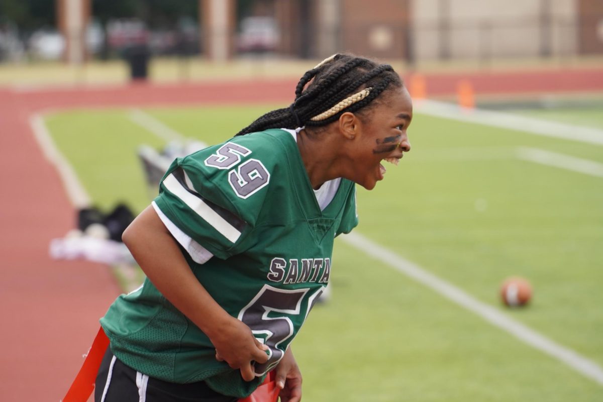 Sophomore student excited after scoring for her team.