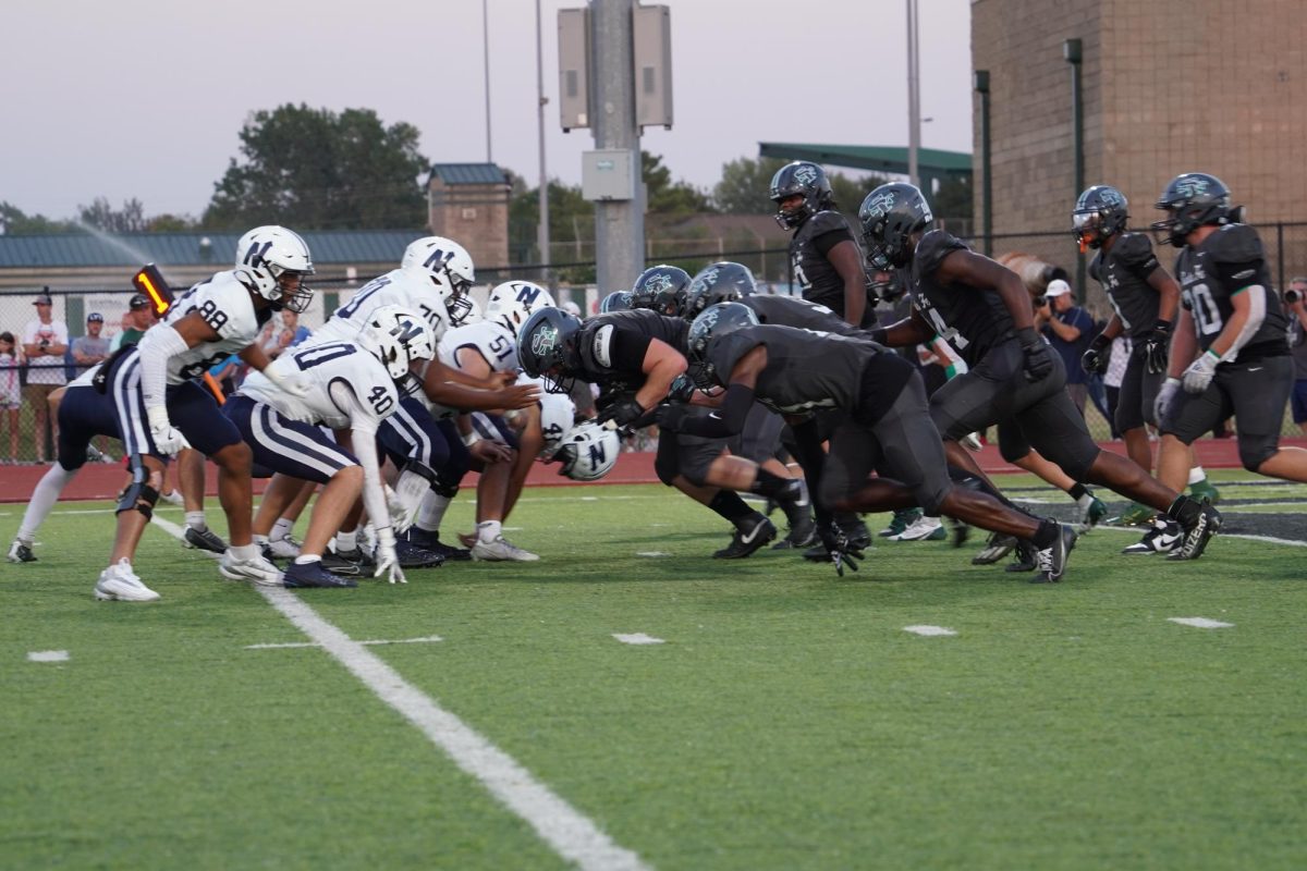 Santa Fe football playing in the first quarter against Edmond North.