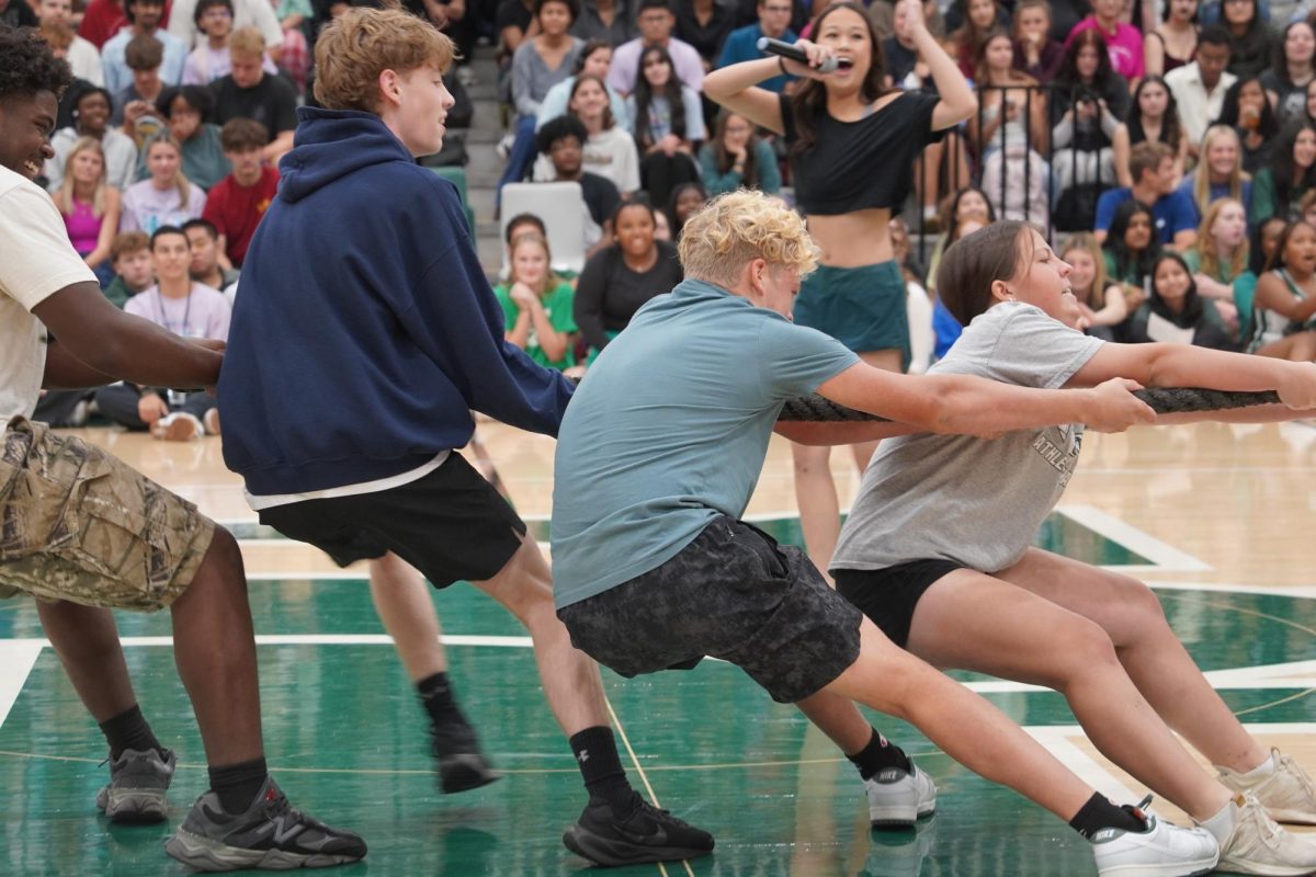 Students trying to win tug-of-war.