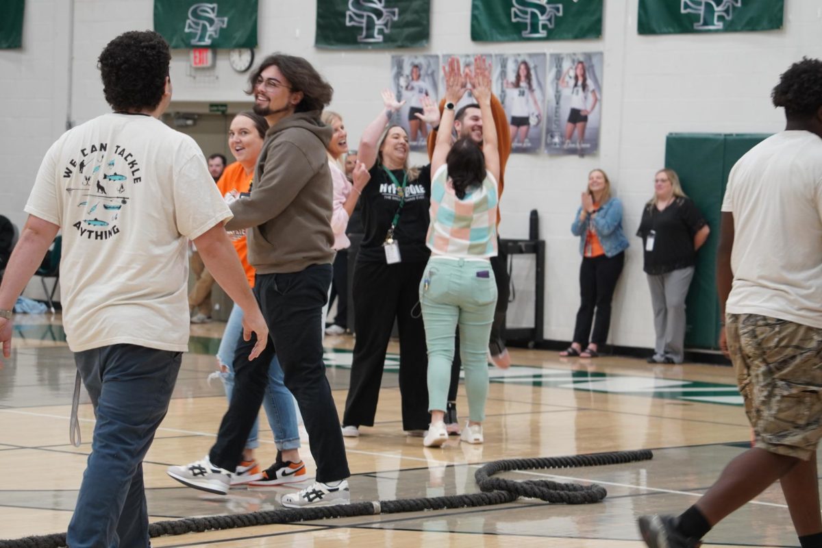 Teachers celebrate their win against students.