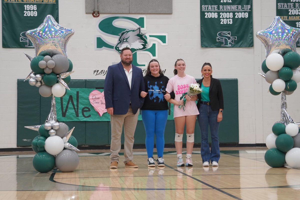 Senior Drew Warner and her family on Senior night. 