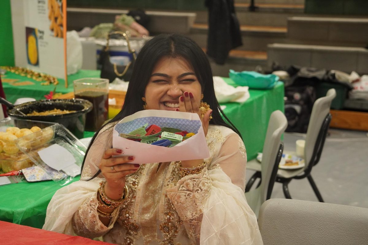 Senior Tashifa Altaf excited at how many tickets her booth had raised.