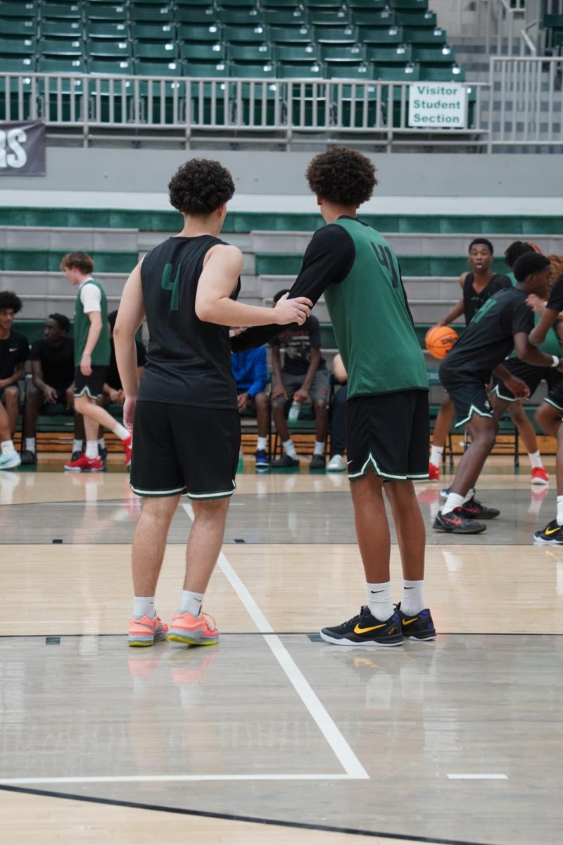 Matt Castro (left) and Tyce Murchison (right) guarding each other.