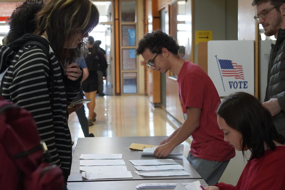 Lucas Bost, Jackson Hannah, Paisley Gomes participate in the mock election.