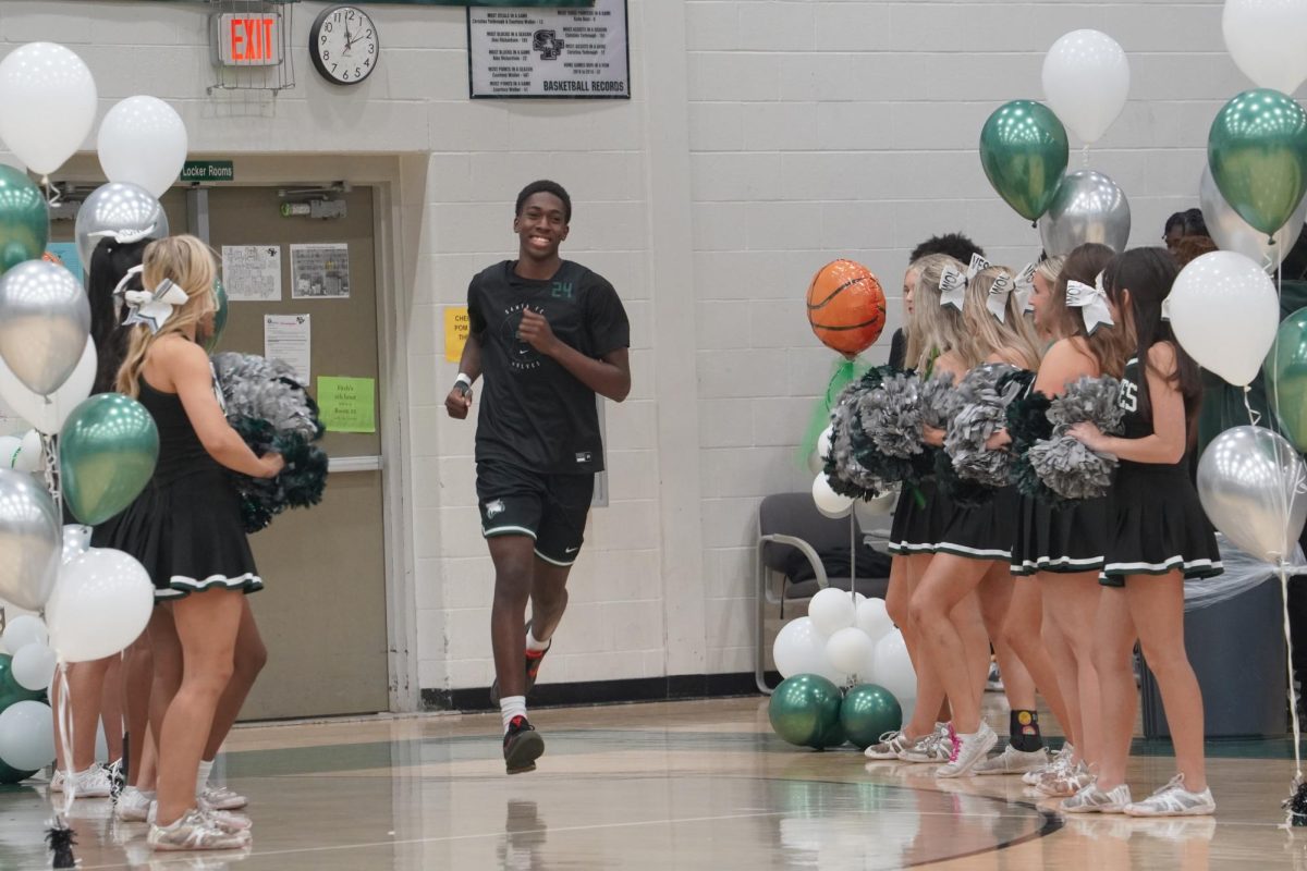  Freshman TJ Newton getting introduced with varsity. 