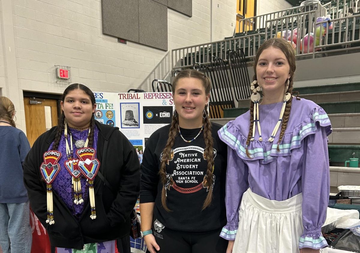 Madison Woodward (on the right) pictured in her cultural dress. 