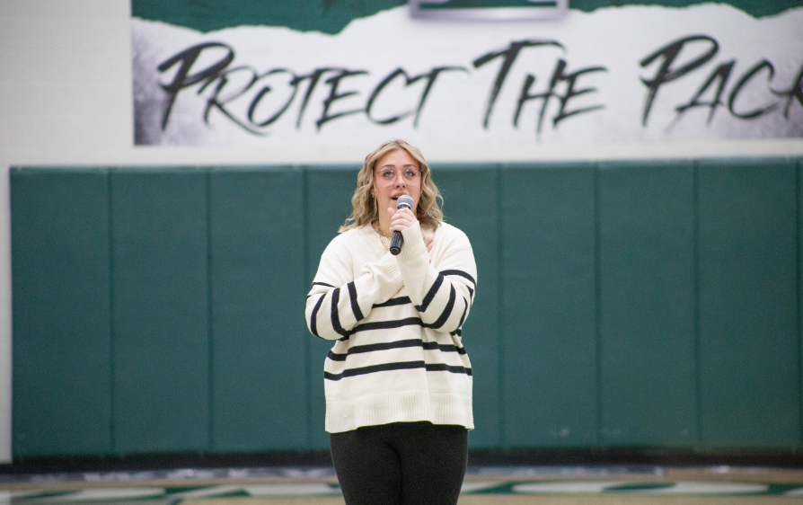 Senior Abigail Bennett singing the national anthem.