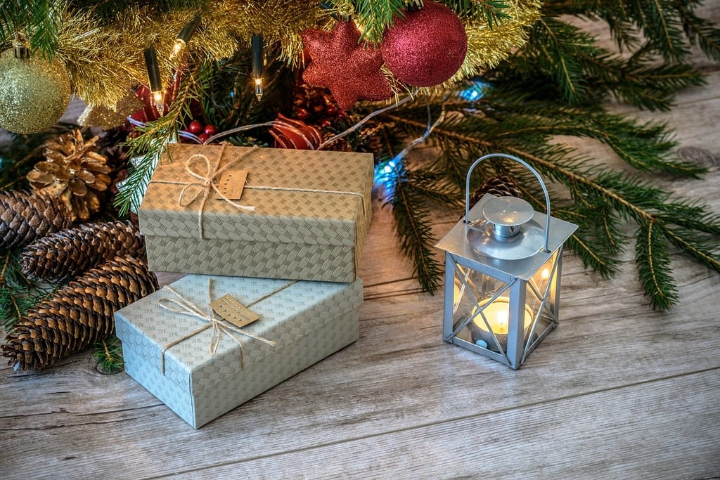 A christmas tree with presents under it