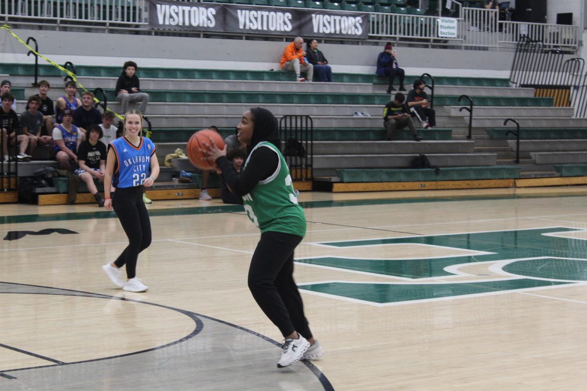 Sara Hassan shooting the ball