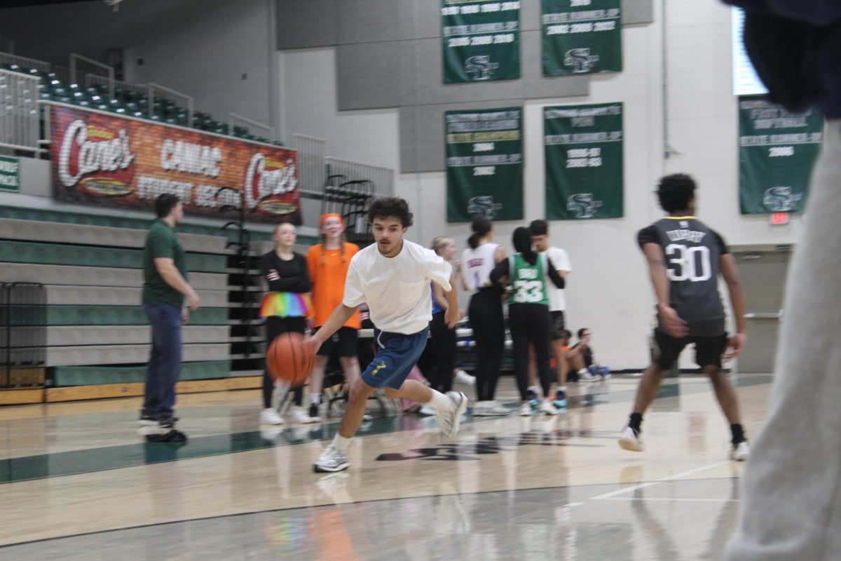 Student dribbling at 3x3 tournament