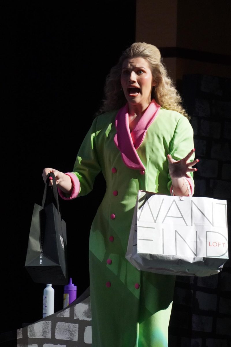 Senior Reese Hollingsworth, as Mrs. Wormwood, shocked at the color of Mr. Wormwood's hair.