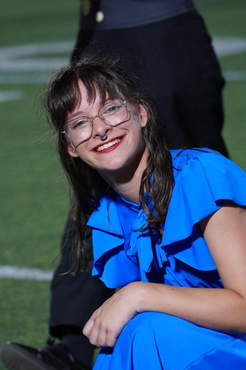 Color Guard member Harper Culley smiling for a picture.