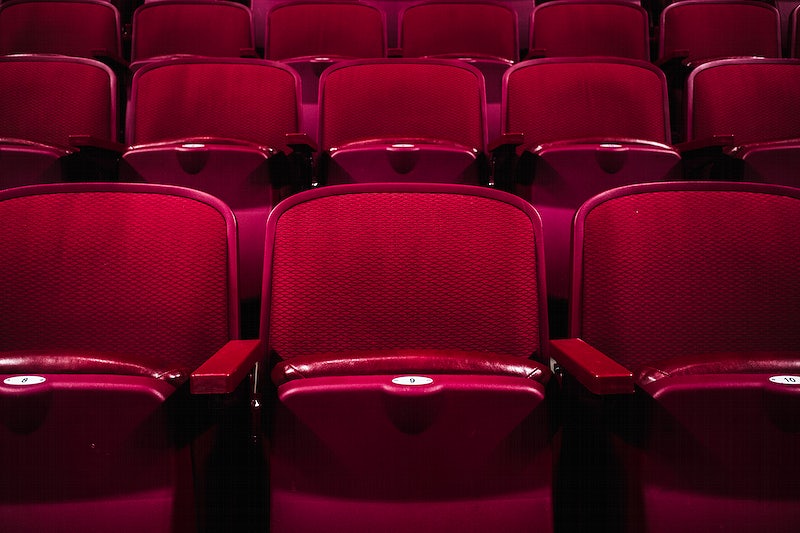 Empty movie theater seats.