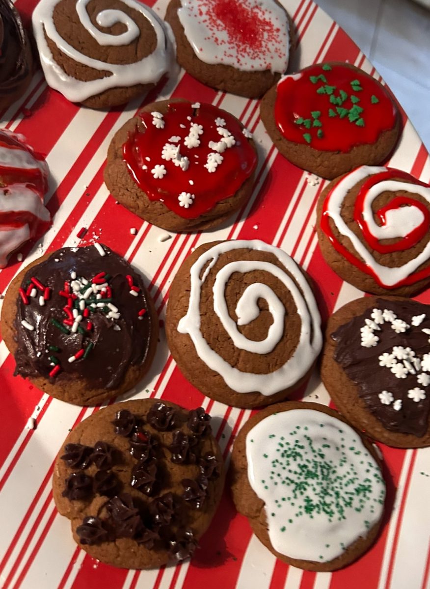 Homemade gingerbread cookies decorated with Christmas icing