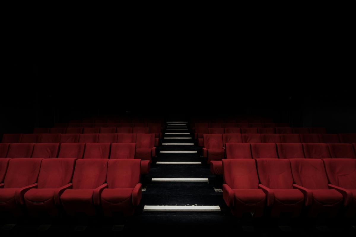 An eerie set movie theater matching the theme of the movie. 