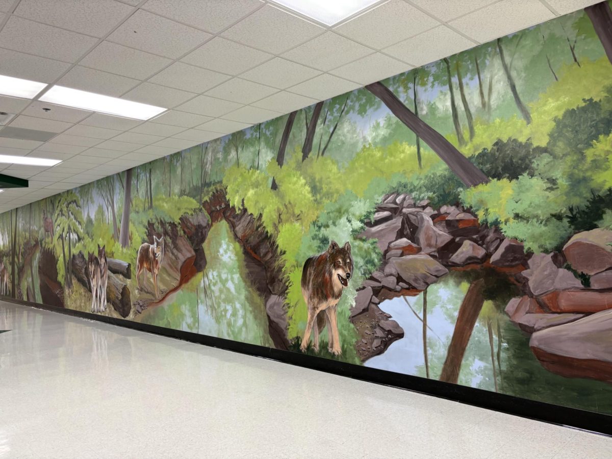 Coplin's favorite mural, "The Wolf Trail," located by the Freshman Academy.