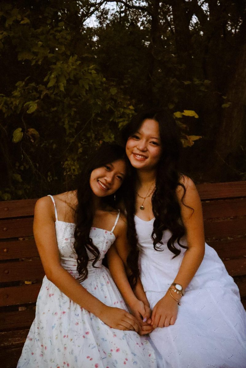 Seniors Karla Le and Emme Shum posing together at Hafer Park in Oct. 2025.