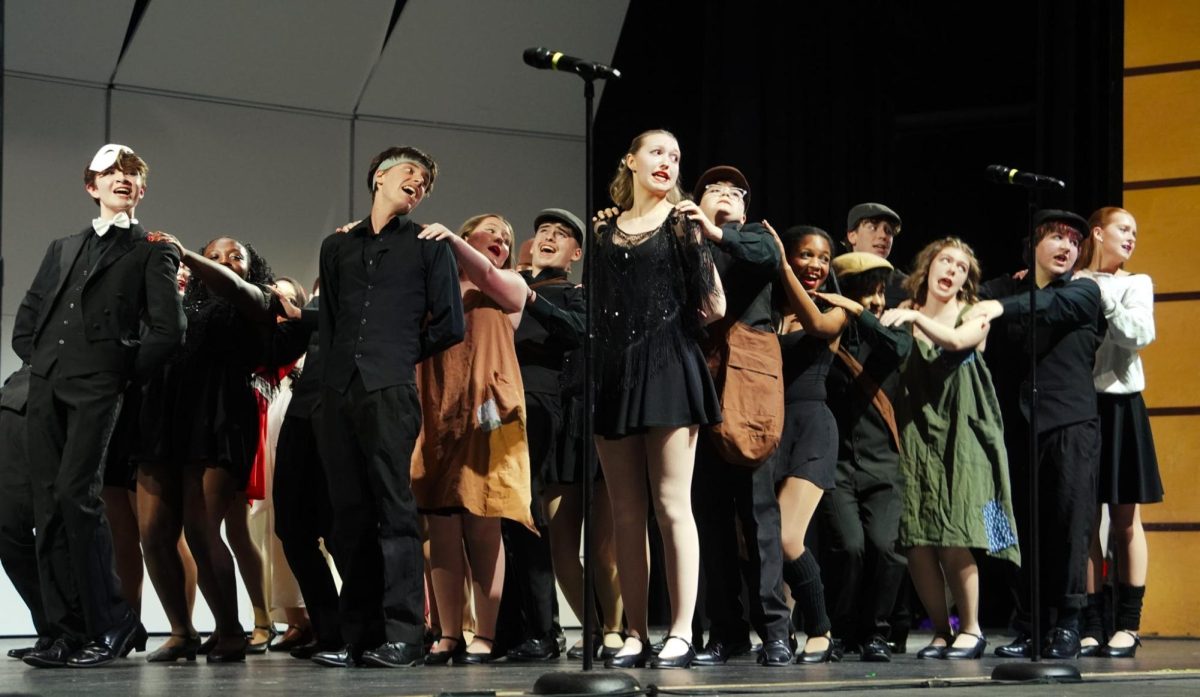 Finalé in costumes from various musicals during their song "Something About This Night."