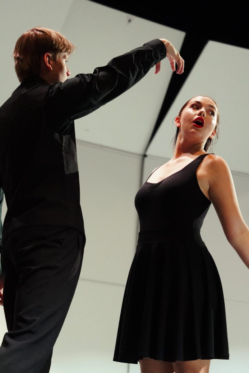 Juniors Landon Hoffman and Bella Merrifield at the beginning of the Finalé show choir set.