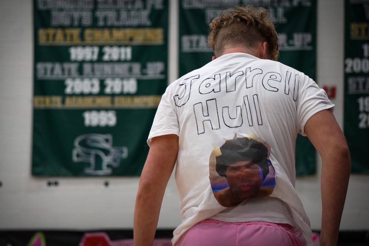 Holden Howard imitating senior Jarrell Hull; he goes on to miss a dunk to make fun of a time when Hull did the same.