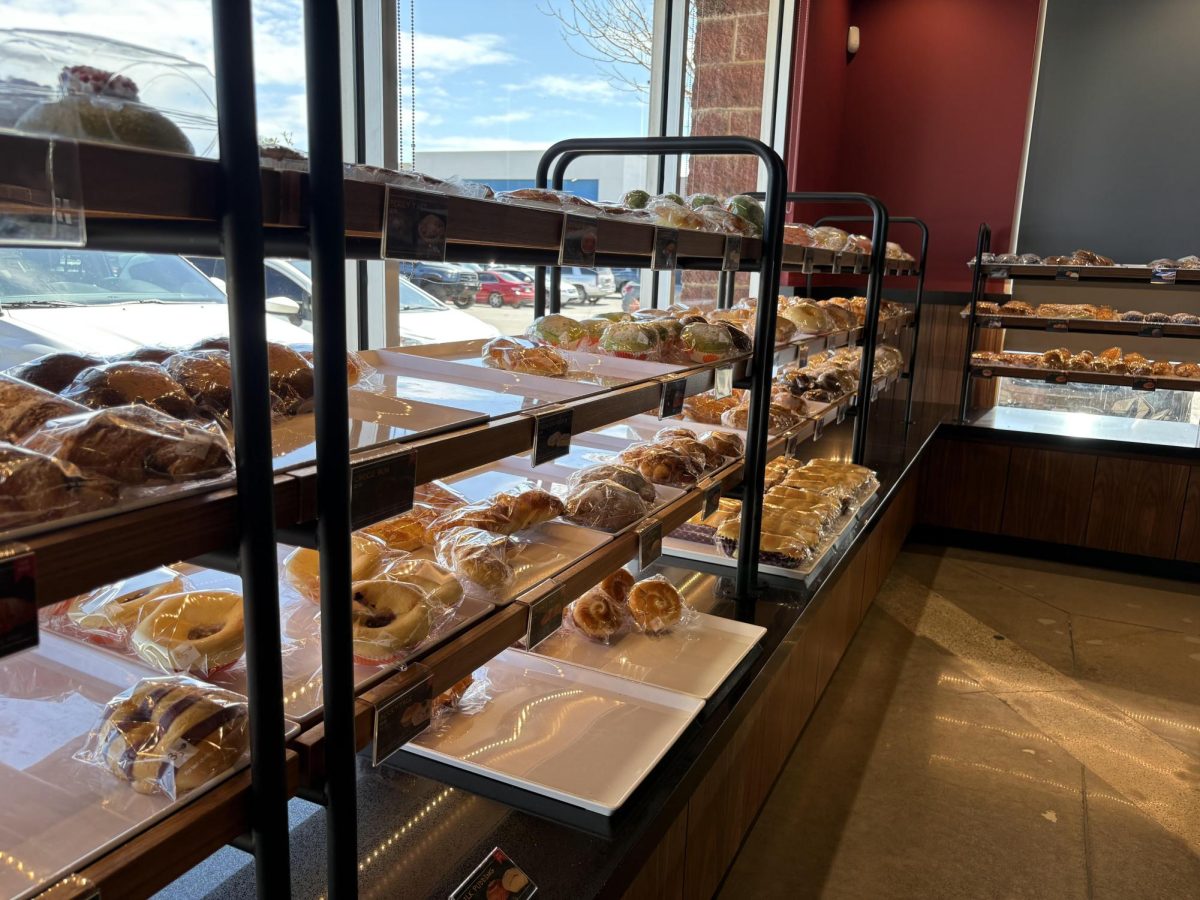 Shelves filled with an assortment of pastries at 85 Degree Bakery.