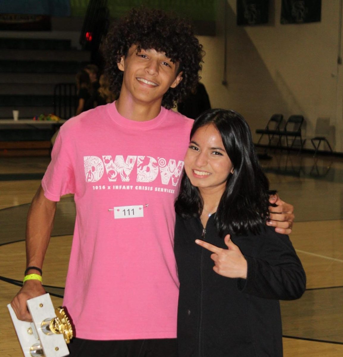 Wolf Games winner Jayden Wallace standing next to Student Council (STUCO) member Nazifa Abdullah.