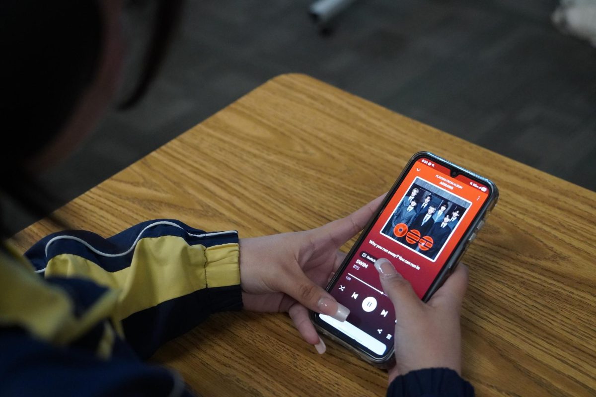 Senior Tristain Moran streaming BTS's new album "Arirang".  