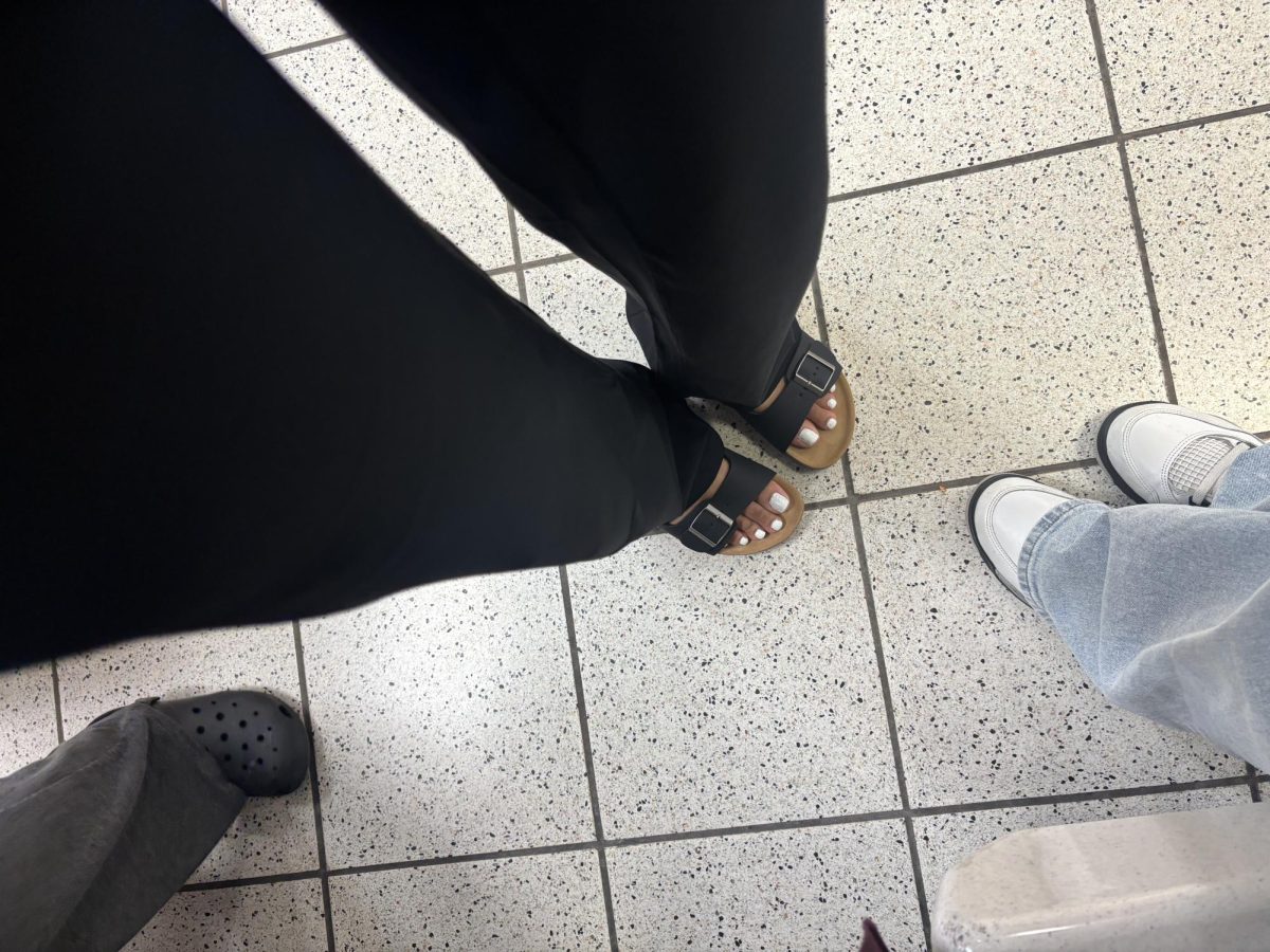 Student participating in "Toes out Thursday."