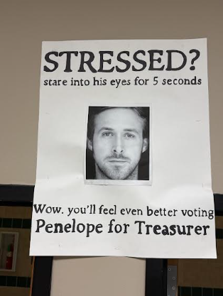 A student's poster promoting votes for the treasurer position 