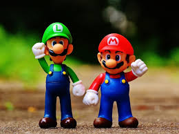Action figures of Luigi and Mario from Super Mario Bros..