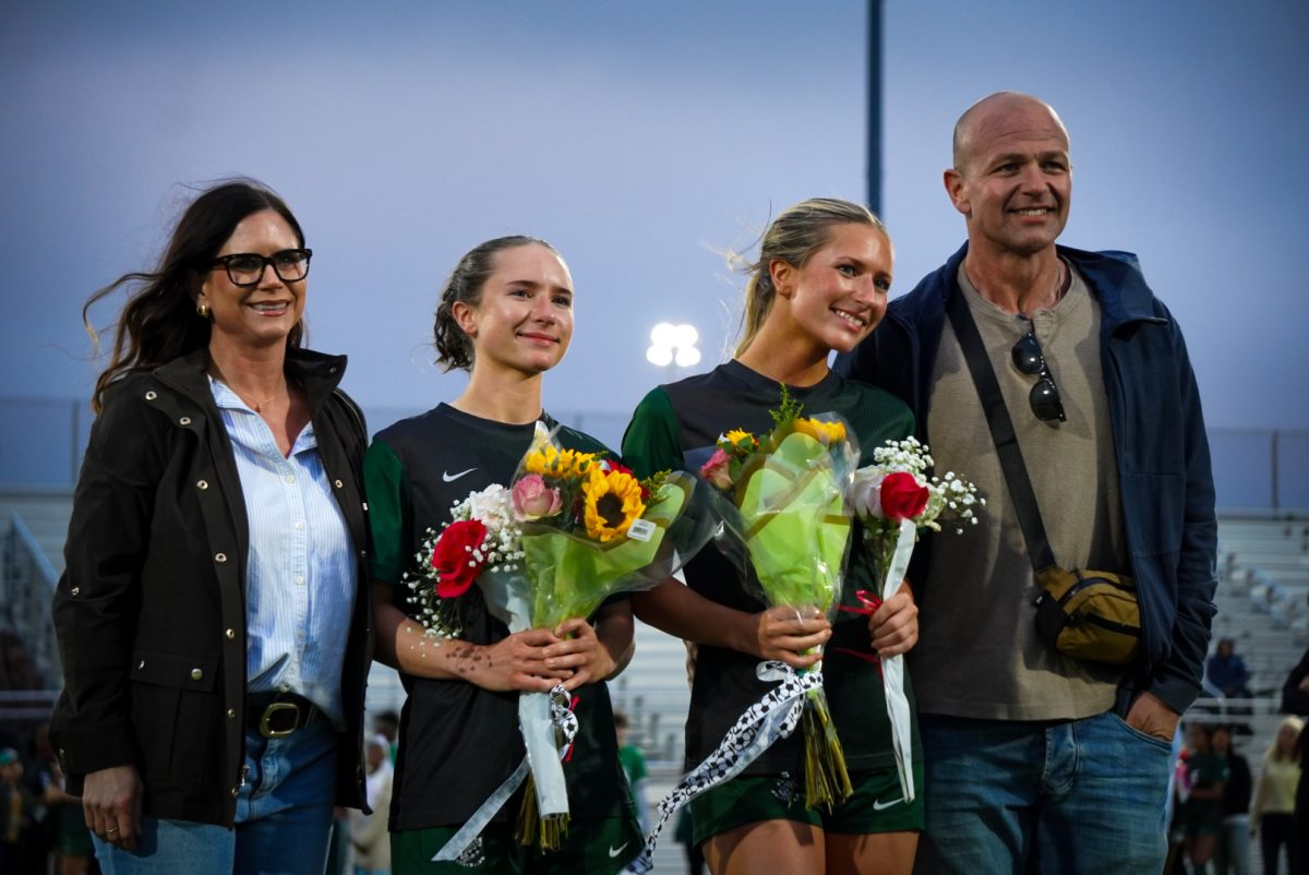 Twins Bailey and Madison McMillion with their parents. 
