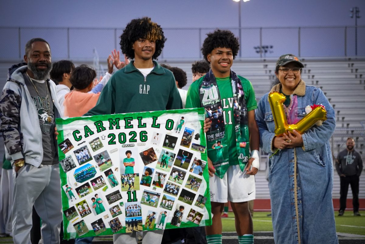 Carmello Myers with his brother and Santa Fe Alum Cir Myers, with his parents as well. 