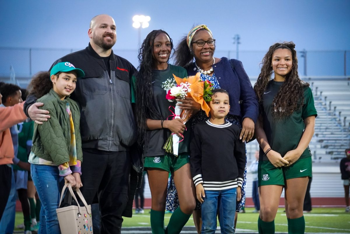 Camryn Paul with her parents and siblings, one of which is another girls varsity player. 