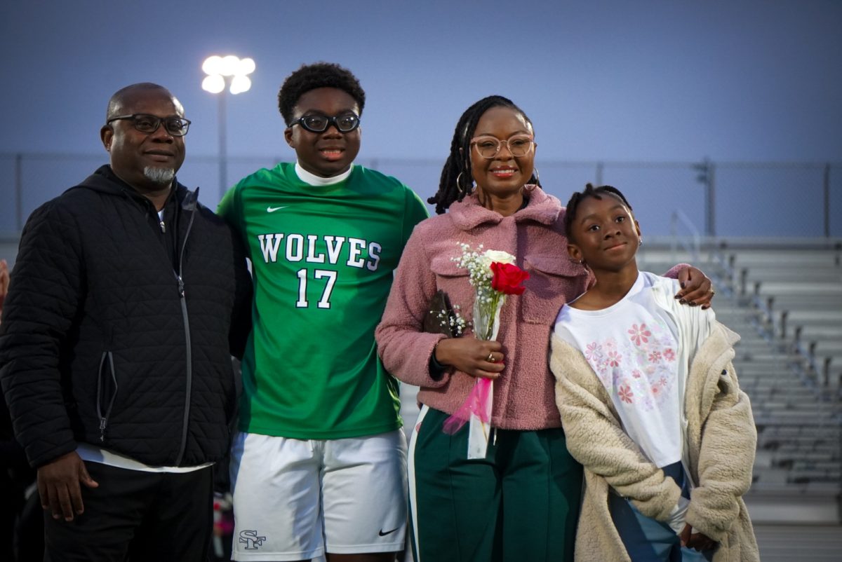 Asher Punni with his father, mother, and sister. 