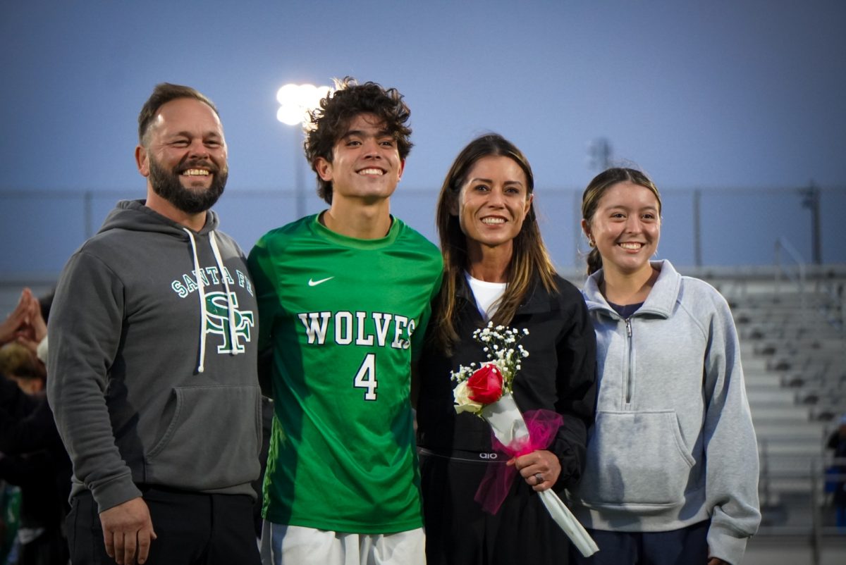 Senior Ben Stevenson with his family posing for a picture. 