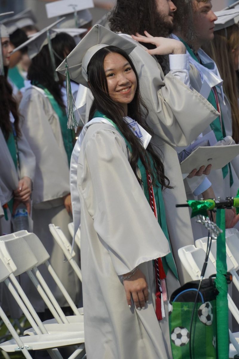 Senior Amy Hoang posing while looking at the camera. 